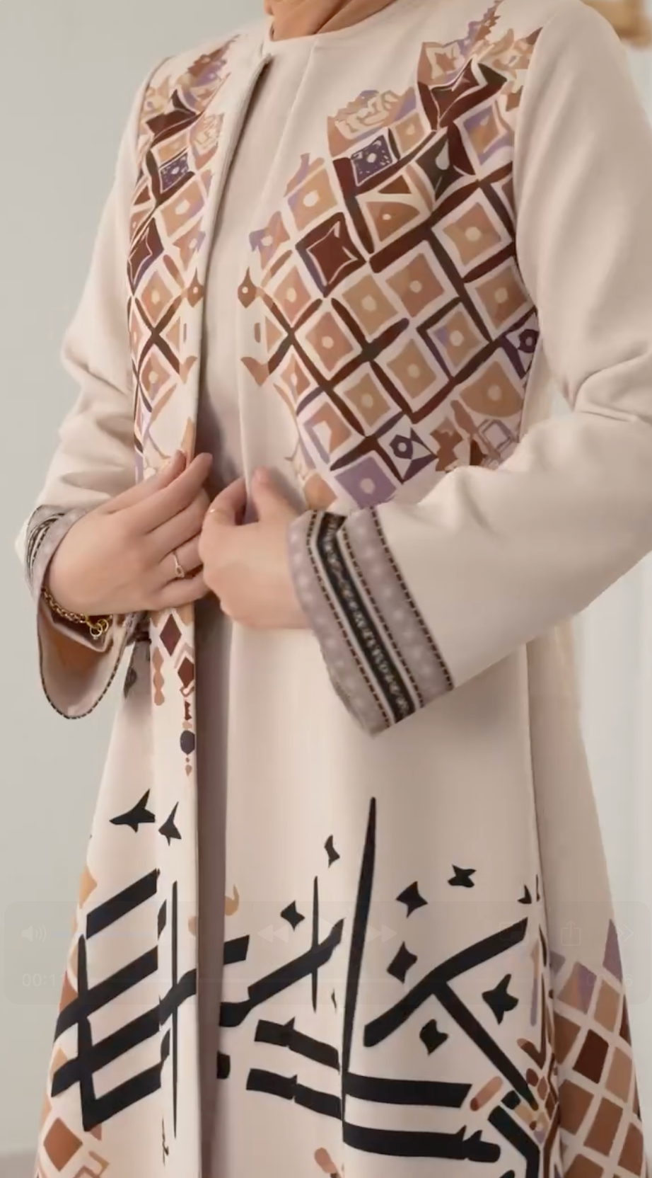 موديل تراتيل - جلباب مع عباية بالنقش العربي